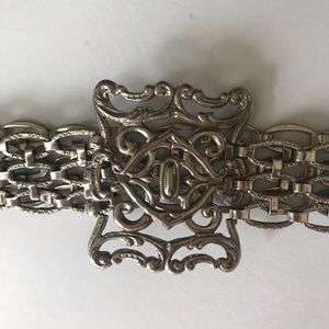 Vintage ornate silver toned belt.